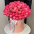 Композиция в шляпной коробке из 113 пионов Корал Шарм в Протвино