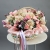 Композиция в корзине "Диодора" из французских роз Квиксенд, диантусов и кустовых пионовидных роз Бомбастик в Протвино